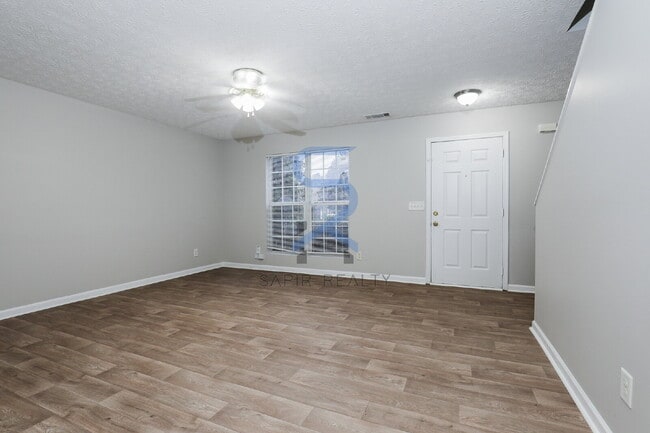 Building Photo - Move in before February 15th and choose your reward: a $250 Amazon Gift Card or a 55" Smart TV!