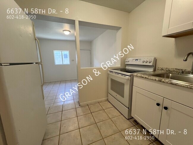 Building Photo - 6637 N 58th Dr