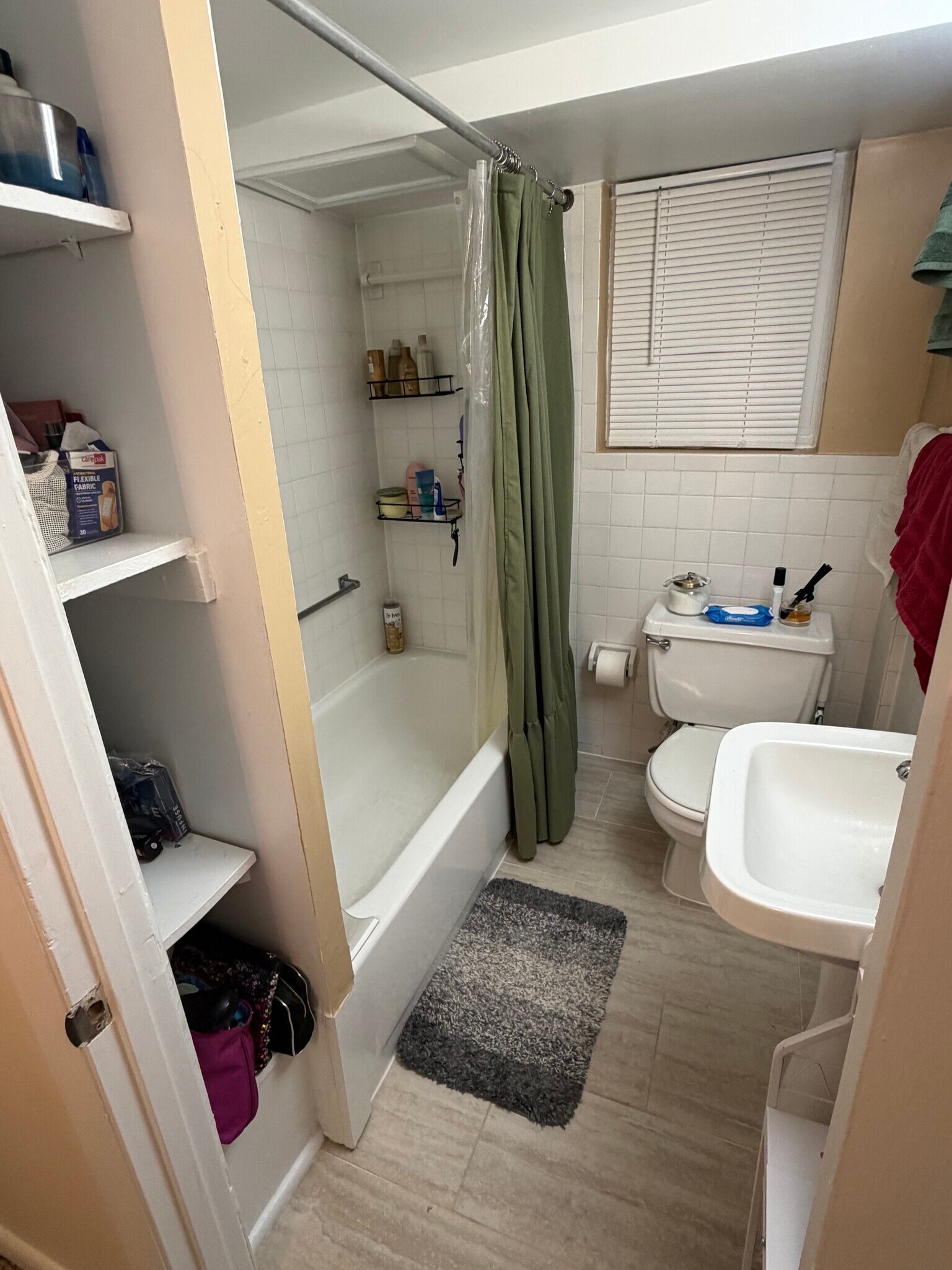 Tub shower bath with new file floor. - 1336 Kenyon St NW