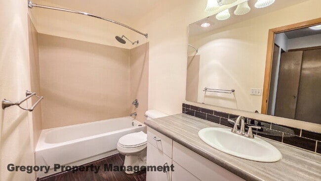 Building Photo - Sunny Capitol Hill 2 BR 1.5 BA Condo with Garage Parking Included & Skyline Views!