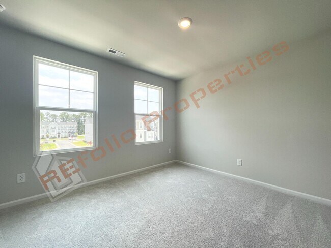 Building Photo - Brand-New 3BR/3.5BA Townhome w/ 1 Car Gara...