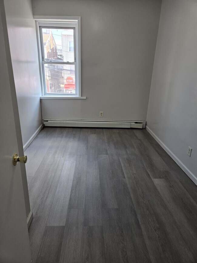 Building Photo - 325-329-329 Grand St