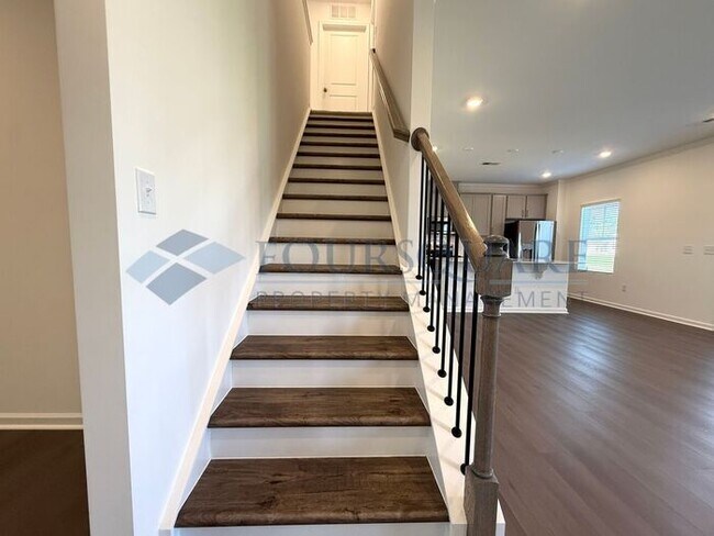 Building Photo - Spacious 4-Bed Home with Flex Room, Loft, Screened Porch & 2-Car Garage – Convenient to Angier an...