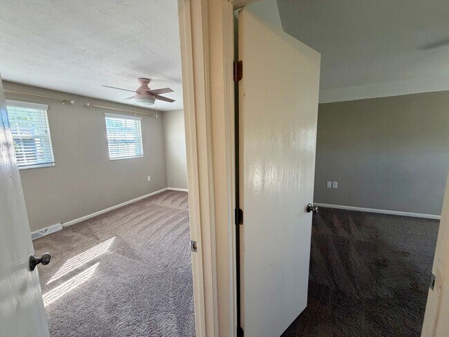 Building Photo - Modern Comforts Await: Spacious Rental with 2-Car Garage, Private Office, and Finished Basement w...