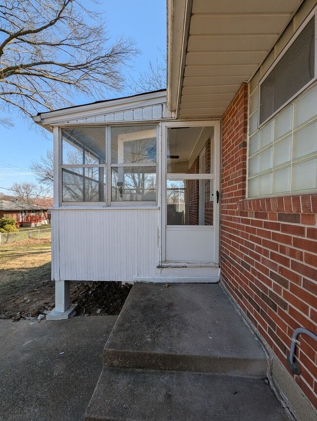 Building Photo - Fully Renovated Home with Sunroom, Garage & Huge Fenced Yard