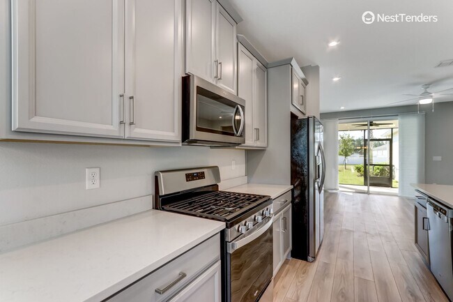 Building Photo - Wildlight Stunner Near Pool & School!