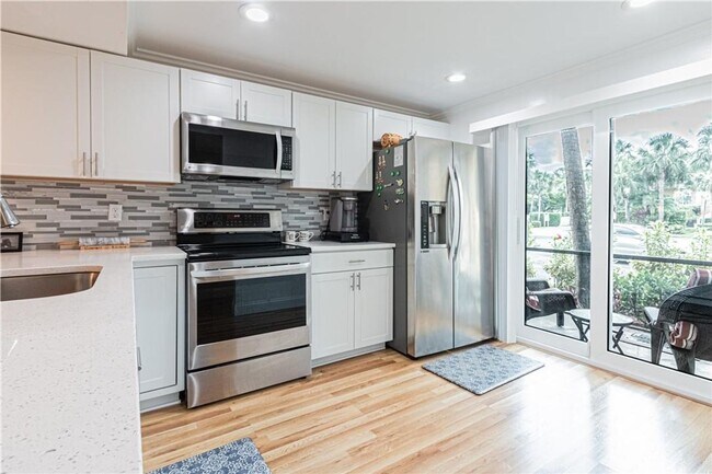Building Photo - Bright & Spacious First-Floor Condo in Winterpark – Naples Living at Its Best!
