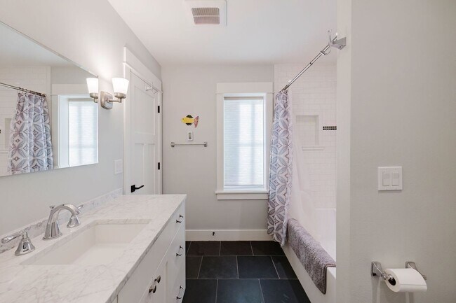 Building Photo - Impeccable Low Bank Bainbridge Waterfront Home with Private Dock