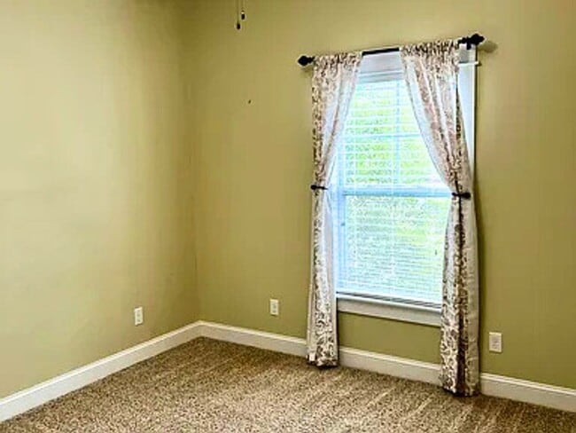 Building Photo - 3/2 updated home with amenities