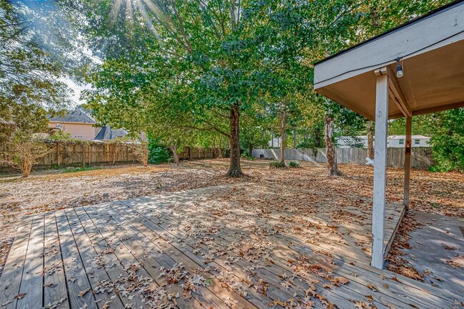 Building Photo - 7135 Woodland Oaks