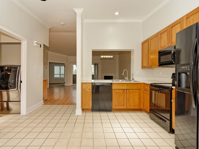 Building Photo - Water, Sewer, Trash Included! Fireplace, Washer, Dryer, 2 Assigned Parking, Garage, Open Floor Pl...