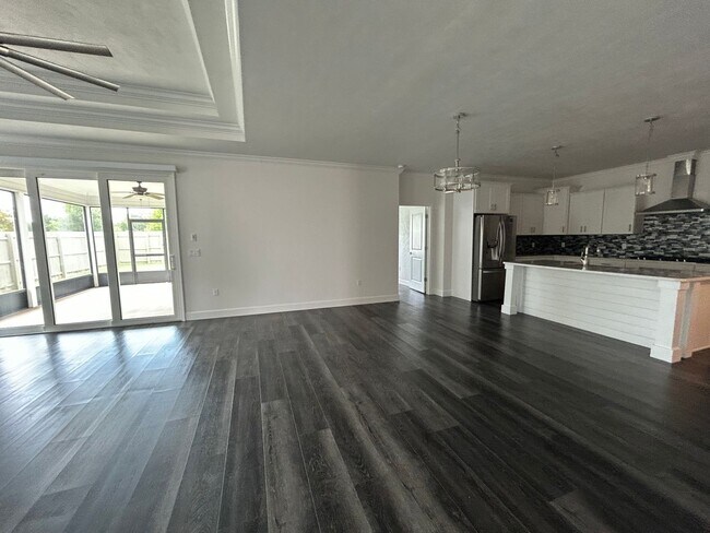 Building Photo - Immaculate 3/2 with Yard, Garage, and Pet ...