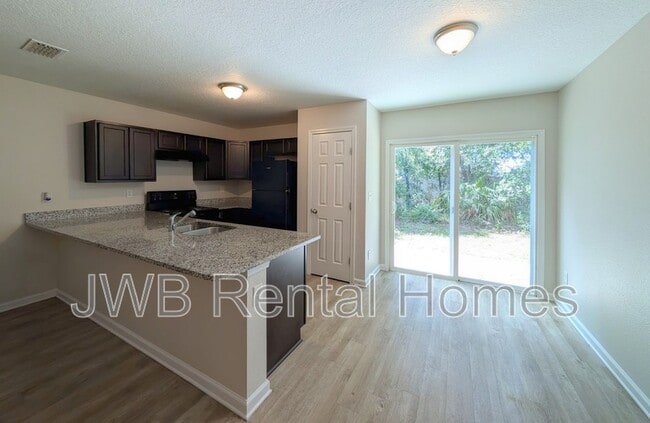 Building Photo - 7820 Playschool Ln