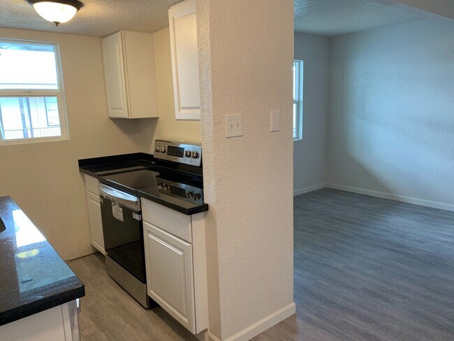 Building Photo - East 12th Townhomes and Apartments