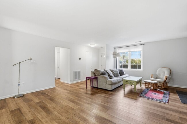 Building Photo - This beautifully refreshed condominium offers a refined blend of style and comfort