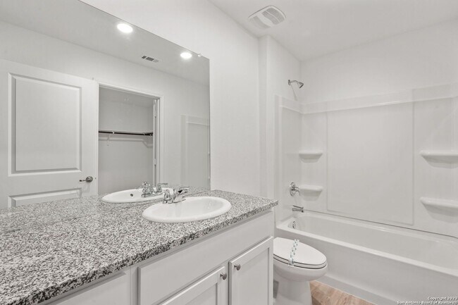 Building Photo - This beautiful single-story home has 4 bedrooms, 2 baths, vinyl flooring throughout, an open floo...