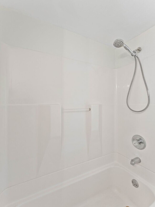 Building Photo - Renovated 3-Bedroom Apartment with Bonus Finished Attic & Spacious Shared Backyard