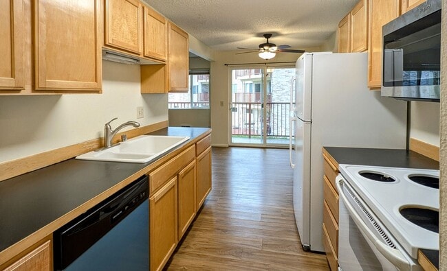 Building Photo - VIEW RIDGE 2 bedroom End Unit Condo in Sec...