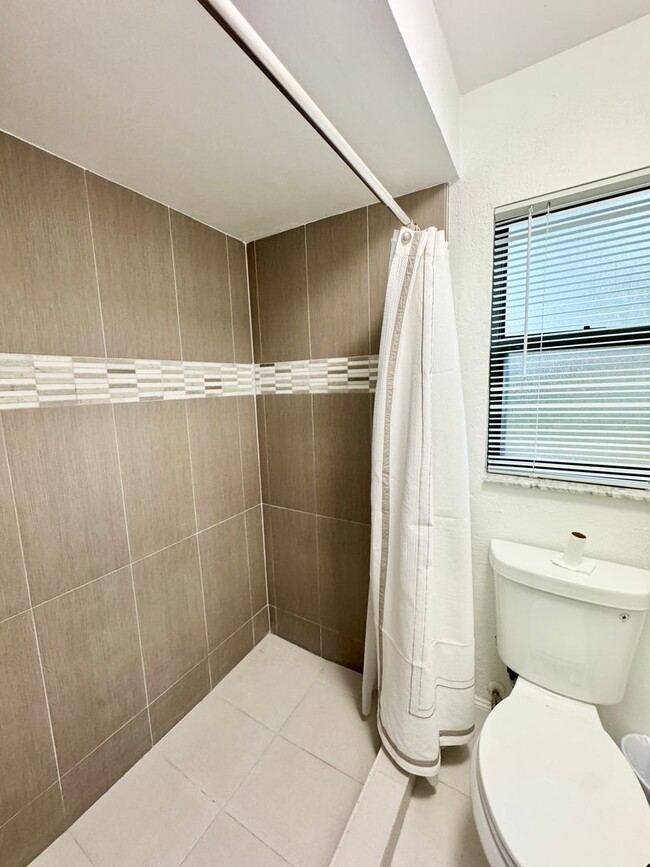Building Photo - Dr. Phillips 3 Bed 2 Bath For Rent at soug...