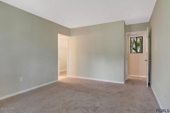 Building Photo - Stunning townhome on Palm Harbor Golf Course!