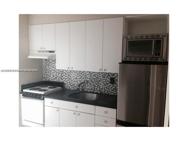 Building Photo - 9920 Collins Ave