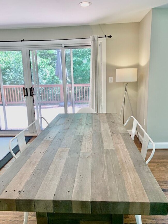 Building Photo - Light filled 2 BR plus 2 rooms, 2 FB including one in finished basement. Great location