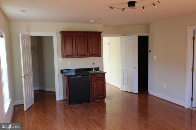 Building Photo - Discover this beautifully updated end unit townhome offering a perfect blend of style, comfort, a...