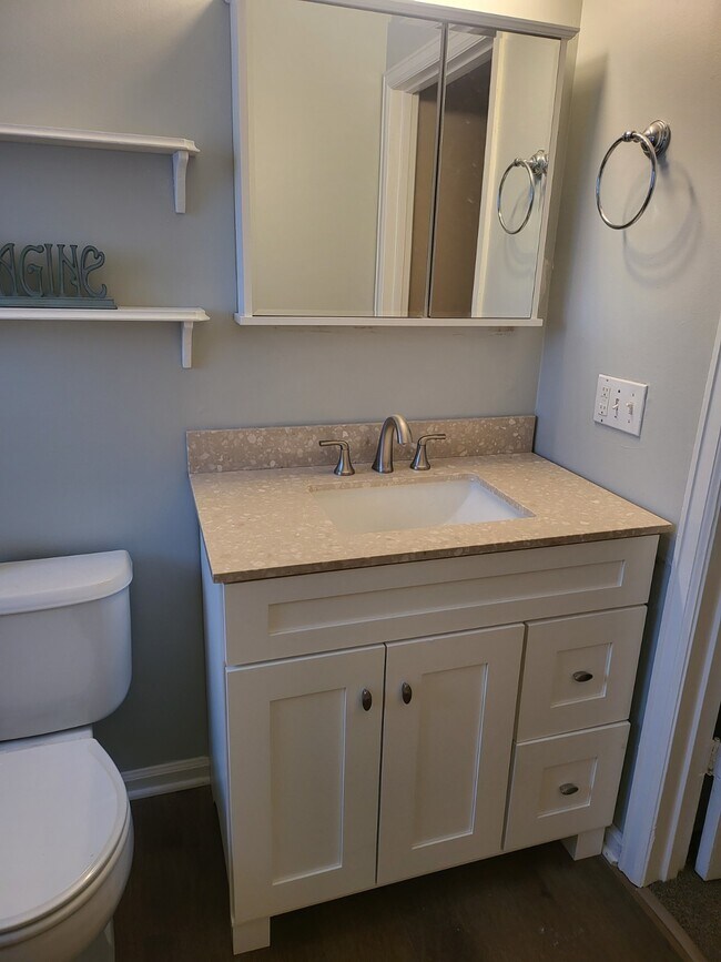 New Vanity, flooring & cabinet - 1777 Parkway Dr S