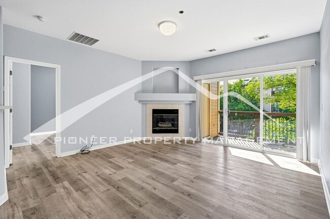Building Photo - Spacious Condo with Central AC, Covered Parking, and Washer/Dryer