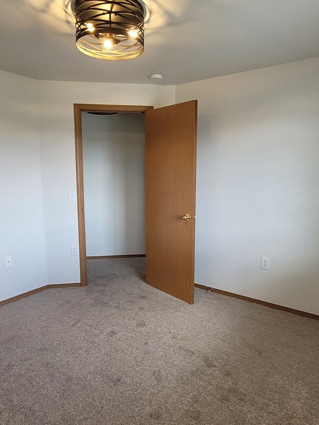 Building Photo - August Rent FREE - 4 Bedroom / Triple Car Garage