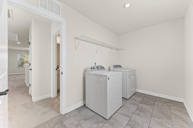 Building Photo - Classic finishes paired with an open, versatile layout!