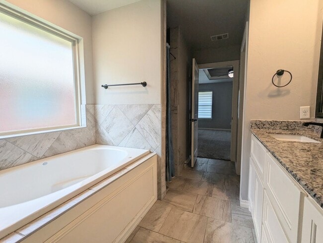 Building Photo - Beautiful Edmond Home | Gas Fireplace, Storm Shelter & Fenced Backyard!
