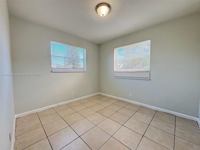 Building Photo - 1051 NW 26th Ave