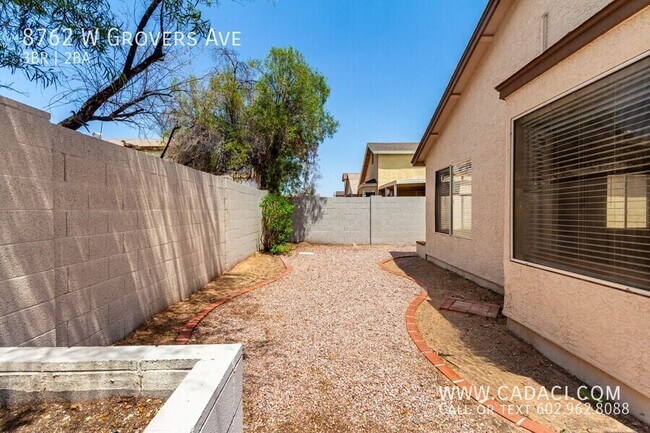 Building Photo - 8762 W Grovers Ave