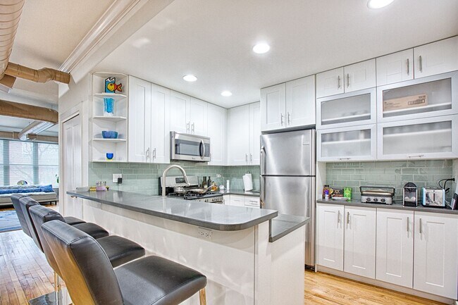 Building Photo - Video Tour- HUGE 1 Bedroom- 2 1/2 Bath Apartment. High-end loft style. Cook's Kitchen- Common Roo...