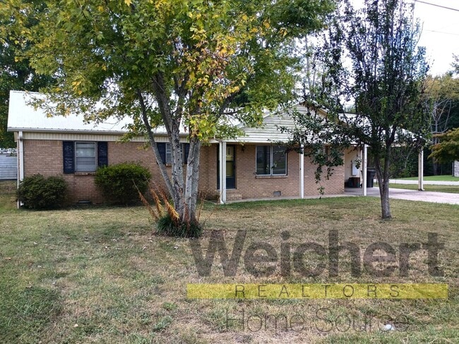 Primary Photo - Updated 4-Bed Home with Fenced Yard & Carport