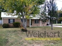 Building Photo - Updated 4-Bed Home with Fenced Yard & Carport