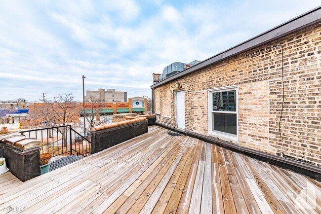 Building Photo - 1 br, 1 bath Condo - 3906 W Belmont Ave