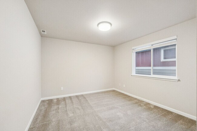 Building Photo - Well maintained 4-Bedroom 2.5 bath Graham home w/ Multiple Living Areas