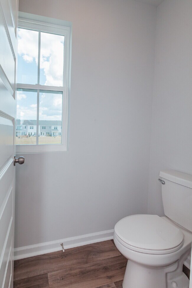 Building Photo - Brand-new 3 bedroom, 2.5 Bath Townhome with pond view