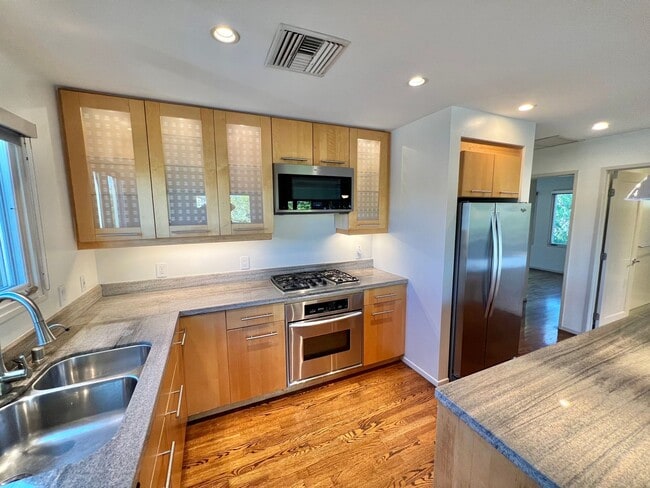Building Photo - Spacious 3BR Bluff Heights Home | Gated Yard, Garage & Modern Upgrades