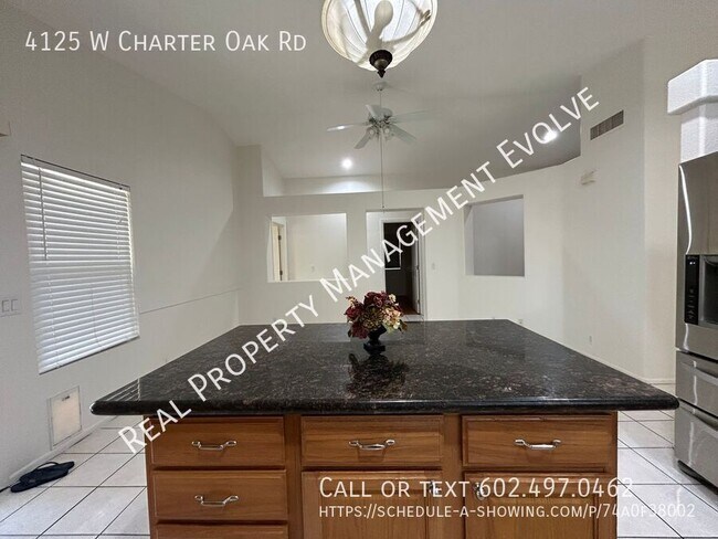 Building Photo - 4125 W Charter Oak Rd