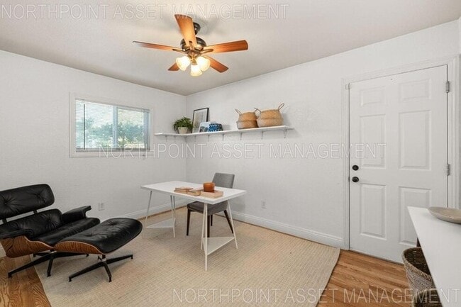 Building Photo - Welcome to this stunning 4-bedroom, 2-bath...