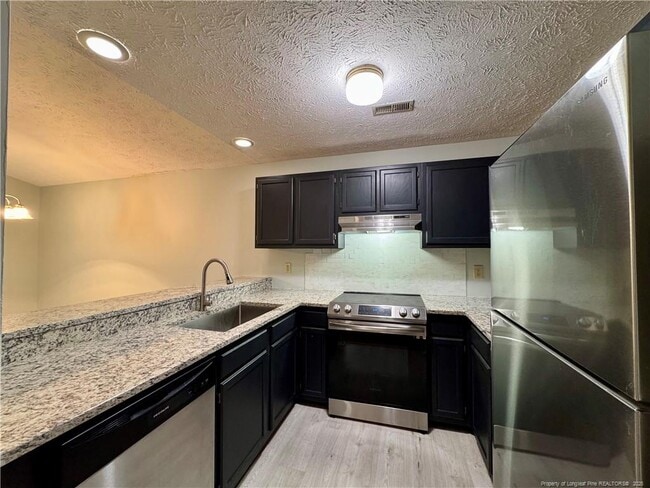 Building Photo - 1899 Tryon Dr