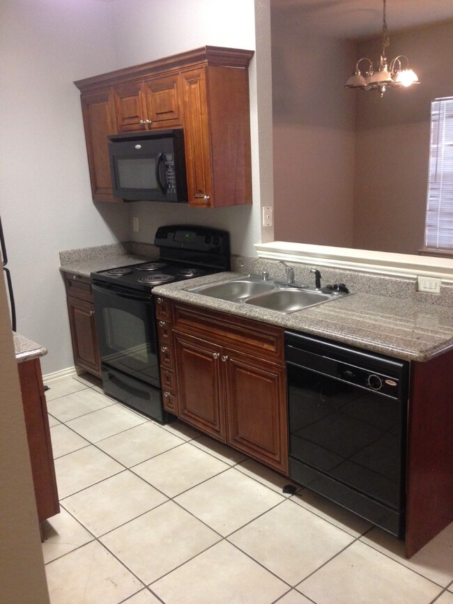 Kitchen and Living Area View - 7626 Anson Cir