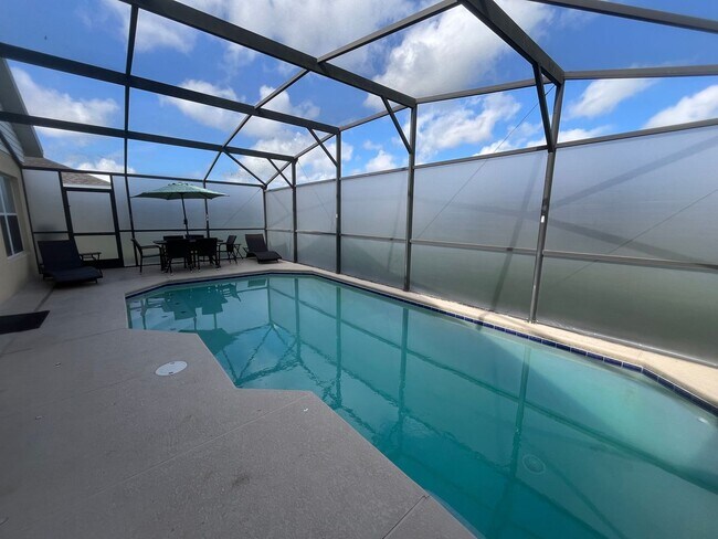 Building Photo - Now Leasing! Stunning 4BR Home in Gated Co...