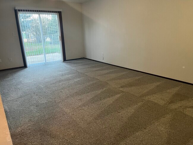 Downstairs den with sliding glass door to back yard - 5400 W 44th St