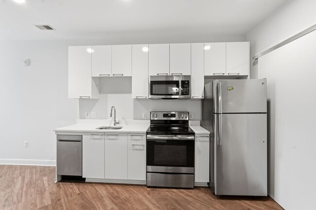 Building Photo - Experience modern living in this beautifully appointed junior one-bedroom/studio featuring an ope...