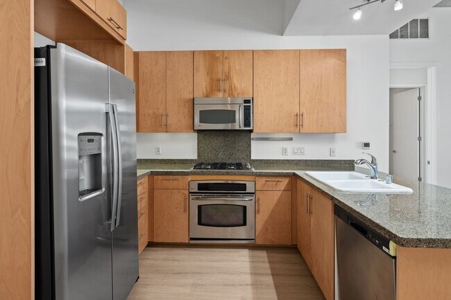 Building Photo - NEW FLOORS! Spacious 2 Bedroom 2 Bathroom ...