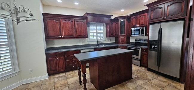 Building Photo - “Elegant 5-Bed Executive Home with Pool – ...